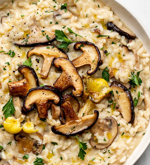 Wild Mushroom Risotto, with Herbs, Smoked Tomato Vinaigrette, and Shaved Parmesan Cheese