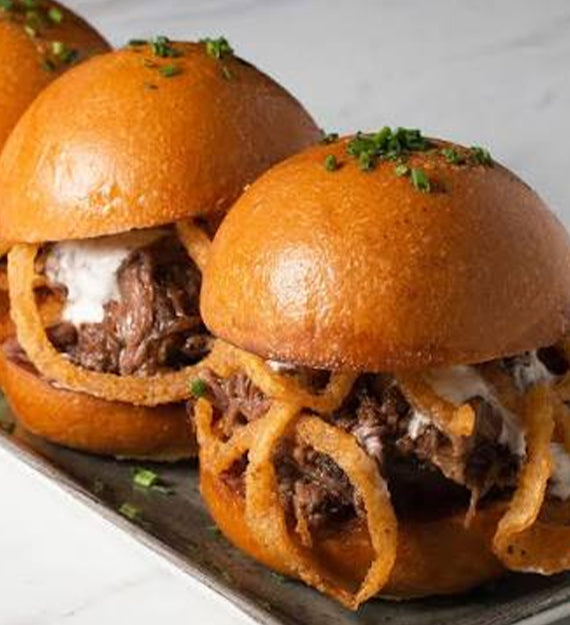 Slow Braised Beef Bourguinonne Cocktail Slider, Red Wine Glace, Horseradish Aioli, and Crispy Onion Strings