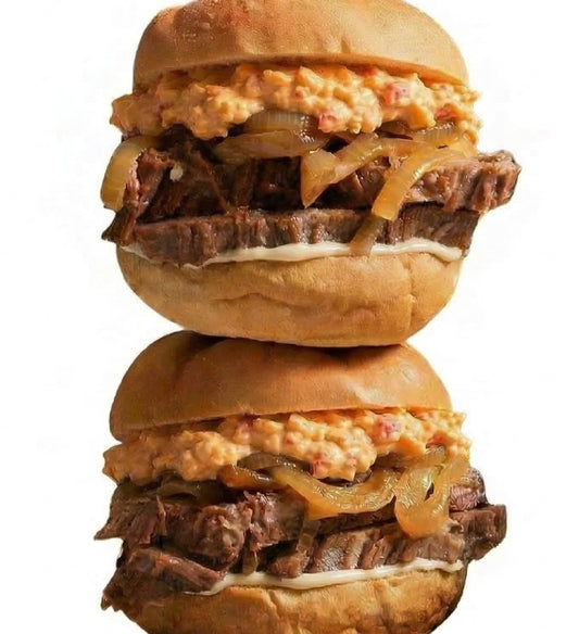 Tender Beef Brisket Slider, Red Wine Braised, Smoked Garlic Aioli, Caramelized Onion, Pimiento Pub Cheese, Crispy Romaine