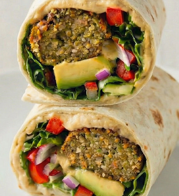 Chickpea Falafel, Garlicky Hummus, Fresh Tomato, Pepperoncini, Cucumber, Lemon Tahini Dressing, Flour Tortilla