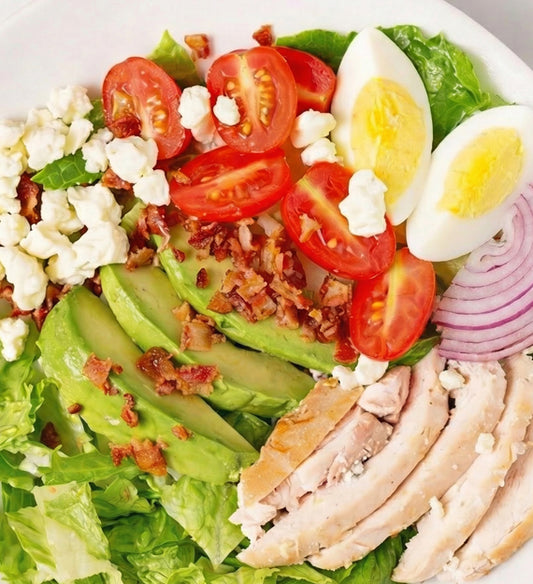 Cobb Salad, with Roasted Chicken, Bacon, Tomato, Hard Cooked Egg, Red Onion, Blue Cheese, Romaine, Apple Cider Vinaigrette