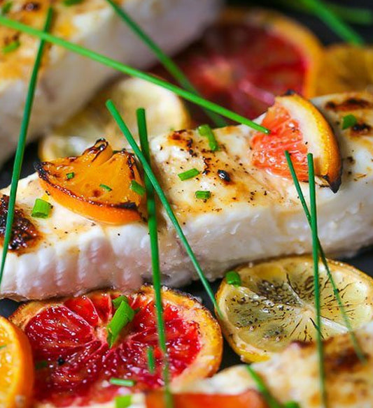 Grilled Citrus Red Snapper, Cara Cara Orange, Ruby Red Grapefruit, Caramelized Lemon, and Lemon Beurre Blanc Sauce
