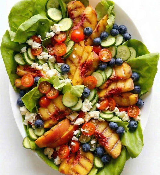 Blueberry Peach Salad, with Gem Lettuces, Hot House Cucumber, Goat Cheese, Red Onion, and Herb Vinaigrette