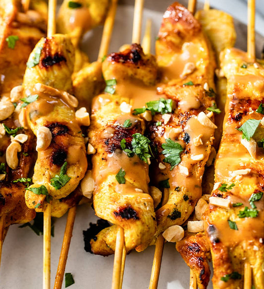 Grilled Sesame Chicken Satay Skewer, Fresh Basil, and Thai Peanut Sauce