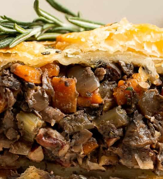 Mushroom Wellington, Farro, Walnuts, Caramelized Onion, Root Vegetables, Parmesan Cheese, Madeira Wine Sauce