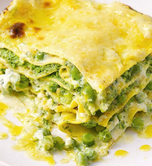 Three Cheese Vegetable Pesto Lasagne, with Spinach, Broad Beans, Peas, Ricotta, Mozzarella, Goat Cheese, and Lemon Zested Creamy Sauce