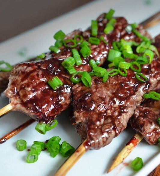 Grilled Sesame Ginger Beef Satay with Spicy Thai Peanut Sauce